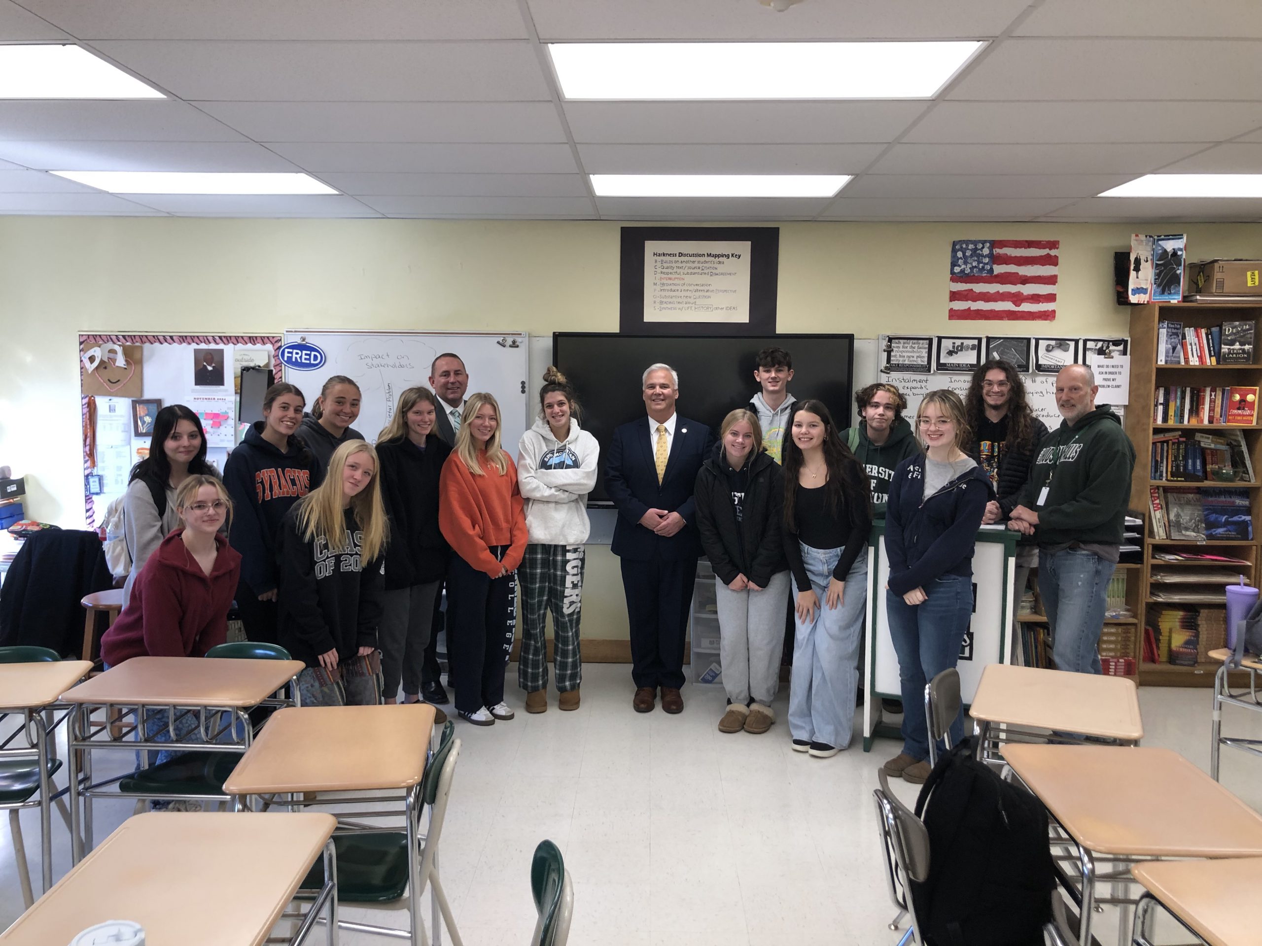 NYS Assemblyman Matt Simpson taking a grou photo with High School seniors and Mr. Nassivera and Mr. Ward