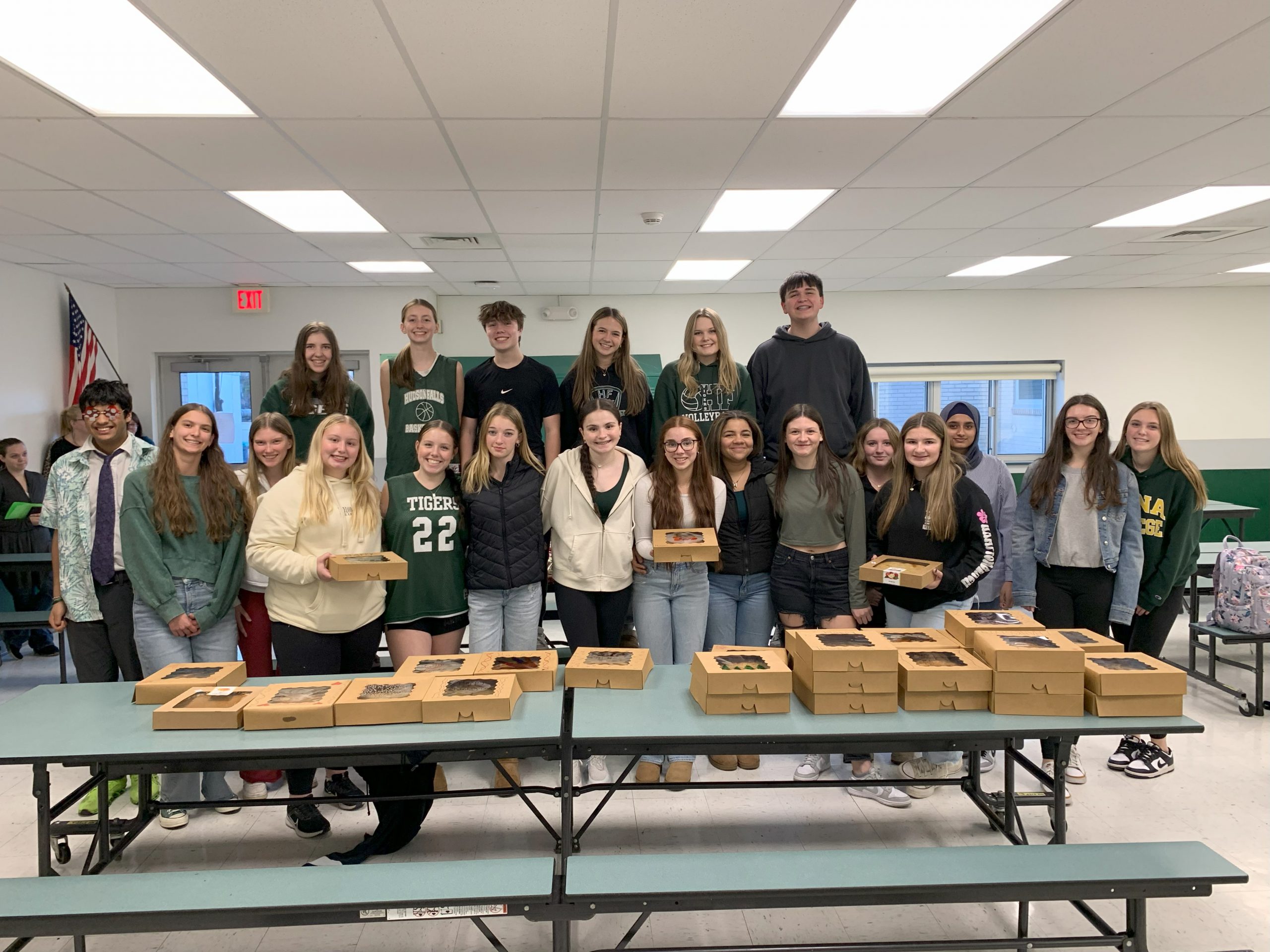 Photo of a group of Student Council members with pies for Thanksgiving donations