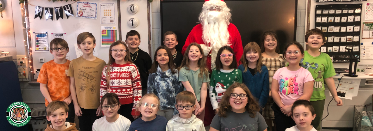 Photo of Mrs. Trevalakis's class with Santa