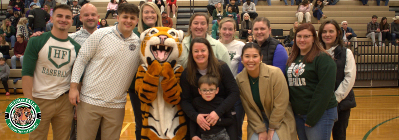 Photo of new teachers at the green carpet event with the Tiger mascot