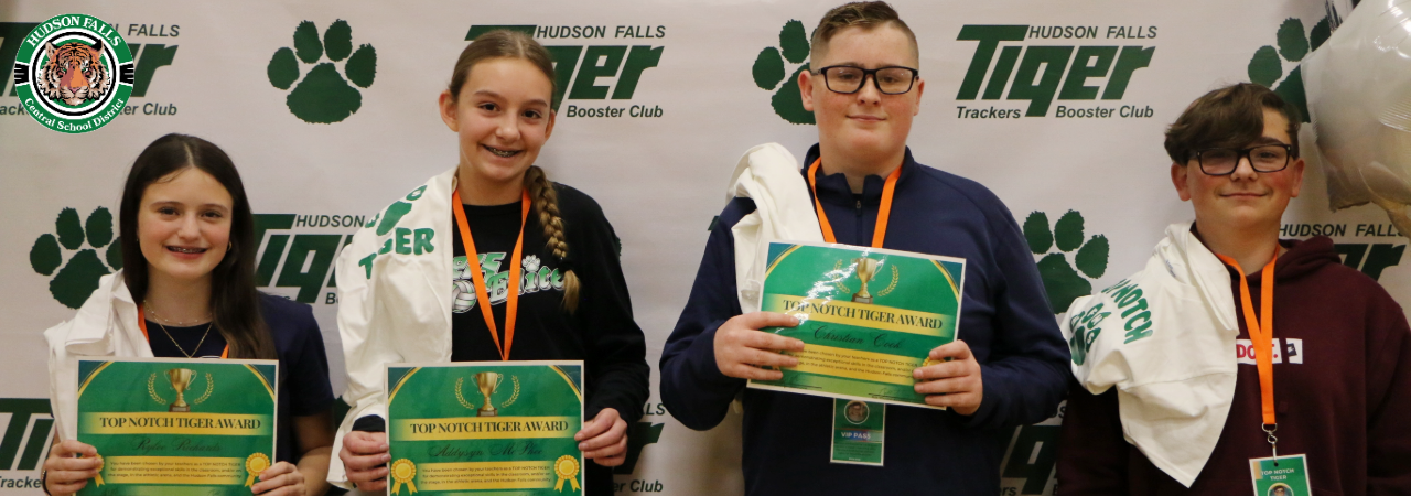 Photo of 2 boys and 2 girls who were named top notch tigers